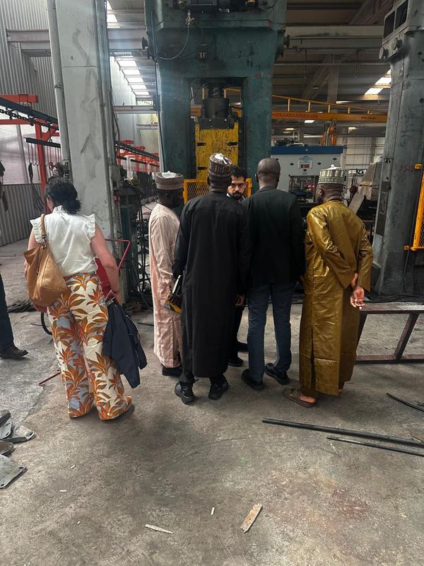The delegation on the factory floor